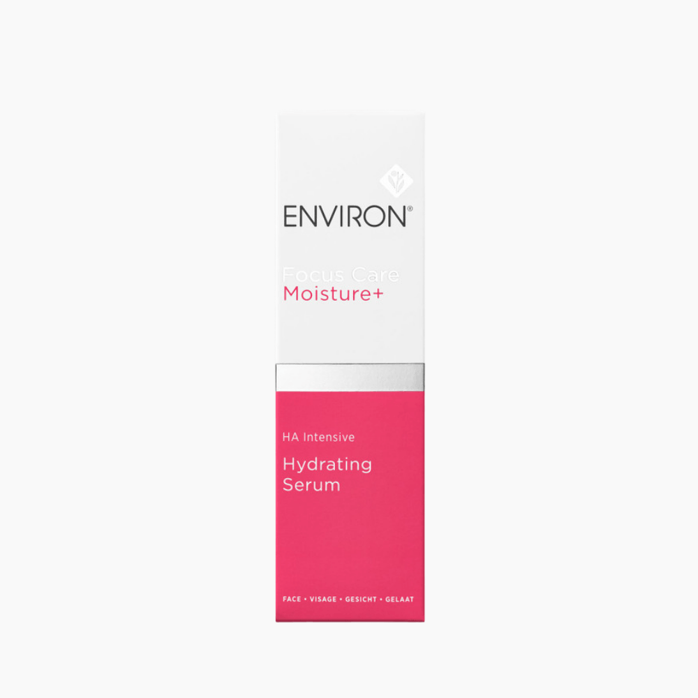 A tall rectangular skincare bottle for ENVIRON Hydrating Serum, featuring a white upper section with black and pink text, and a bright pink lower section with white text.