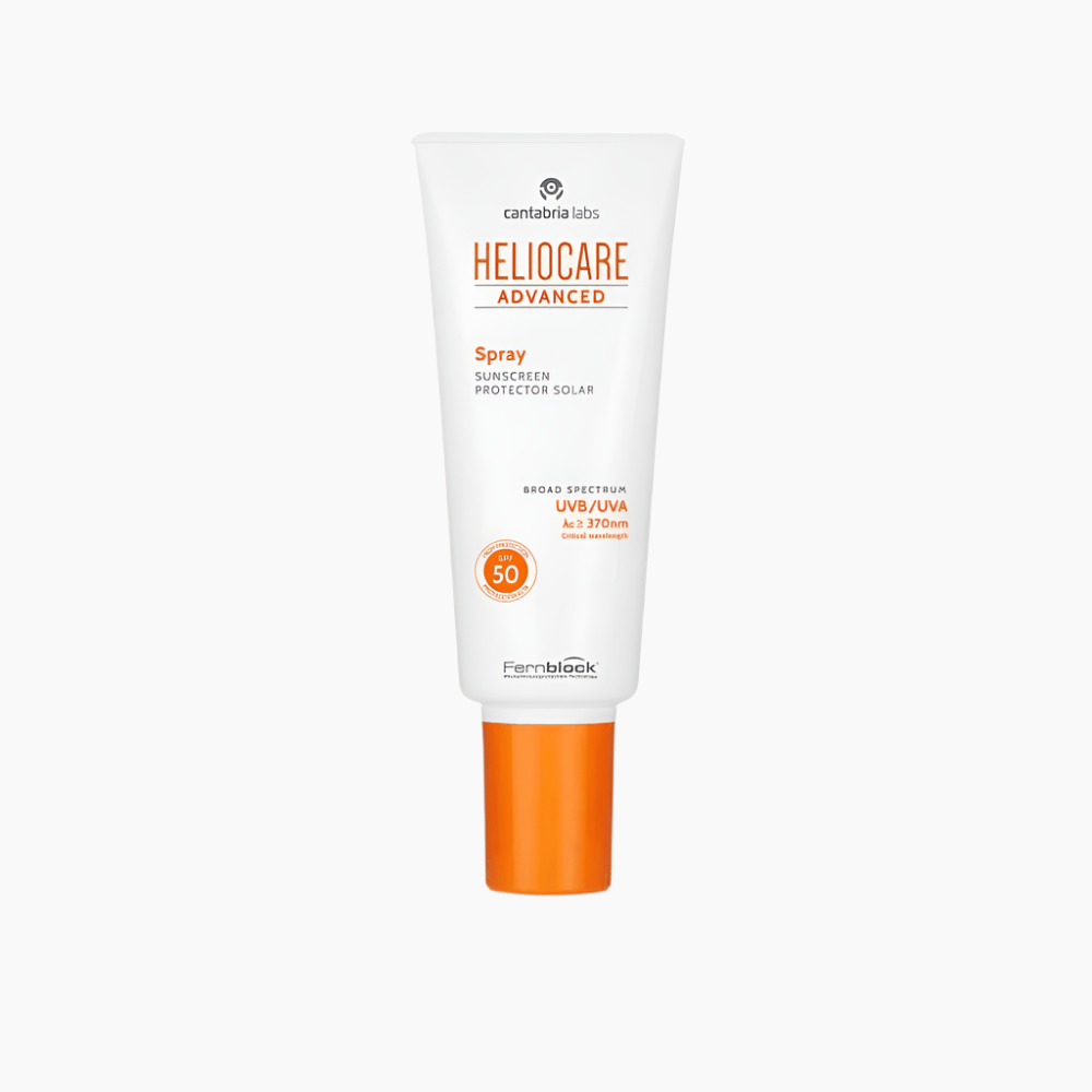 A tube of Heliocare Advanced Spray SPF 50 sunscreen with white and orange packaging.