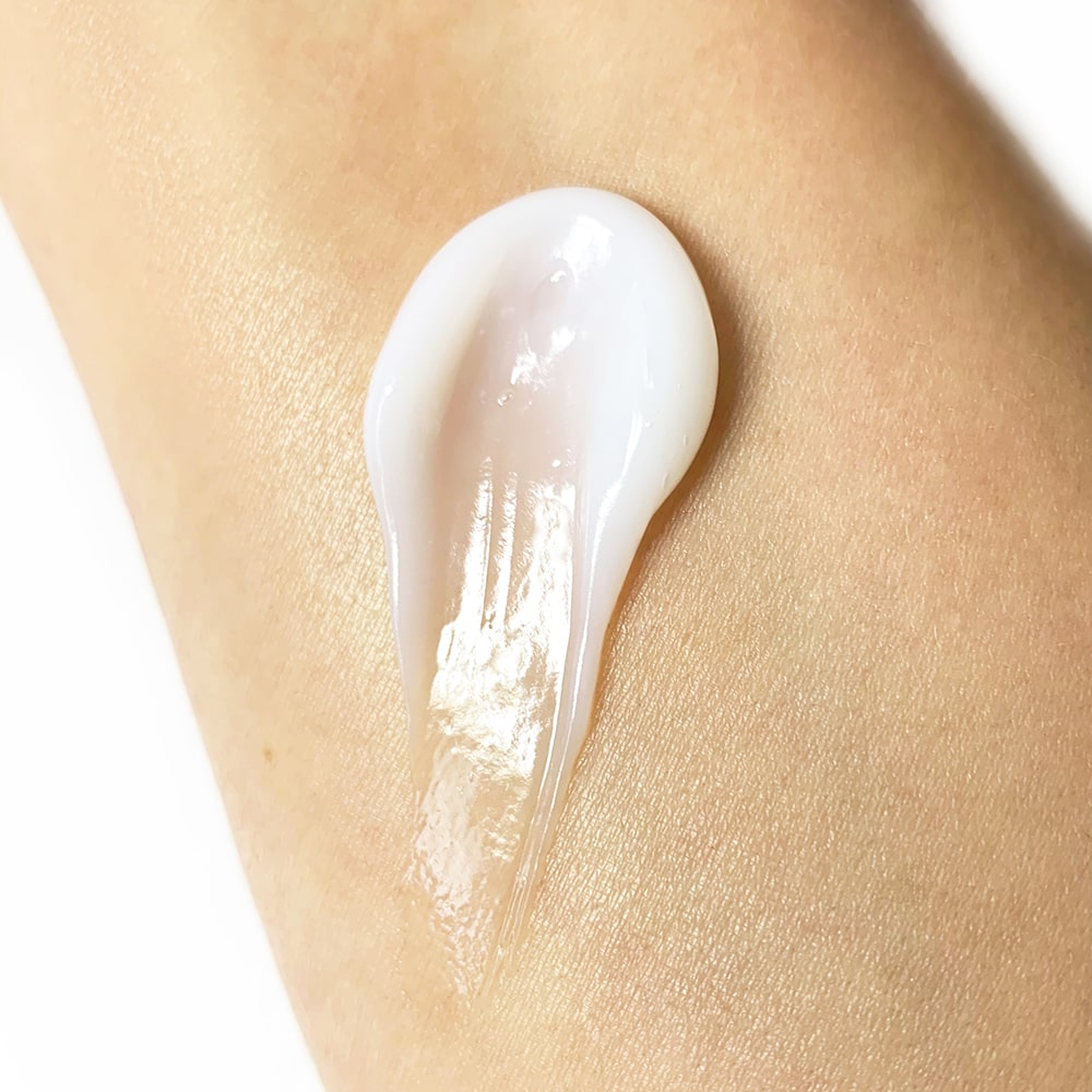 Close-up of a smooth application of cream on skin