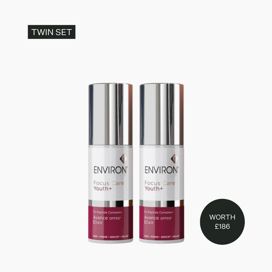 Two skincare bottles labeled 'Environ' on a white background