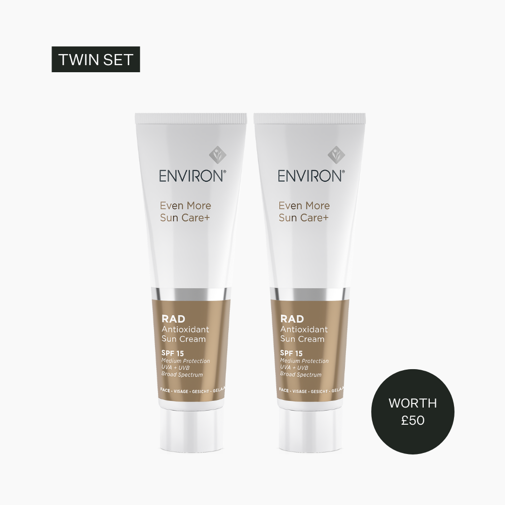 Two Environ sun care cream tubes on a white background