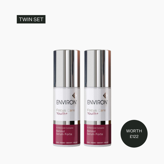 Two skincare serum bottles with 'Environ' branding on a white background.