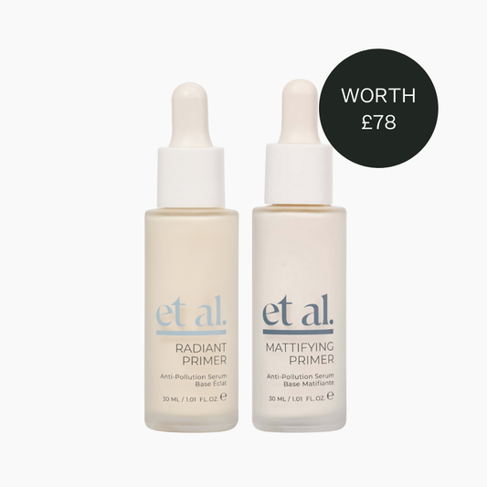 Two bottles of et al. primer on a white background with a price tag label.