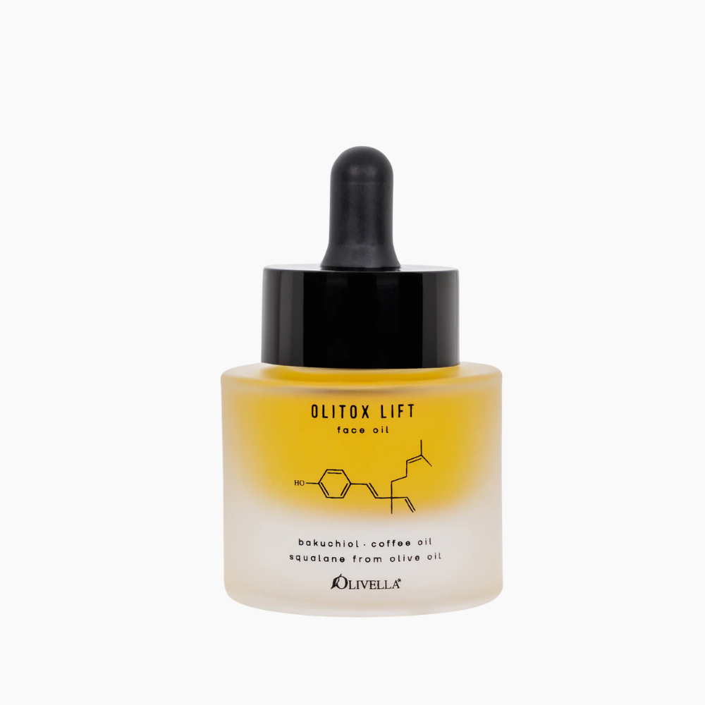 Olivella face oil bottle with dropper on a white background