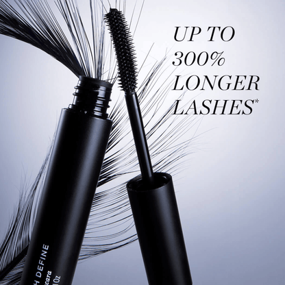 Black mascara tube and wand shown against a light gray background with stylized eyelashes and the text 'UP TO 300% LONGER LASHES'.