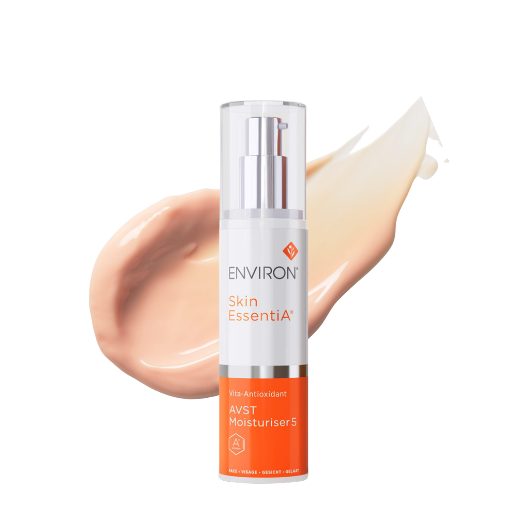 Environ Skin EssentiA AVST 5 50ml bottle with a white and orange label, featuring a pump dispenser. This advanced moisturiser contains the highest level of Vitamin A in the AVST range, combined with Retinyl Palmitate, Retinyl Acetate, vitamins C and E, and powerful antioxidants. Designed to combat signs of ageing, it normalises, corrects, and repairs the skin, stimulating collagen production and improving skin health.