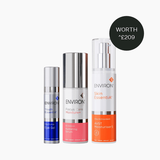 Environ AVST Moisturiser, HA Intensive Hydrating Serum and Vita-Peptide Eye Gel bottles on a light grey background.