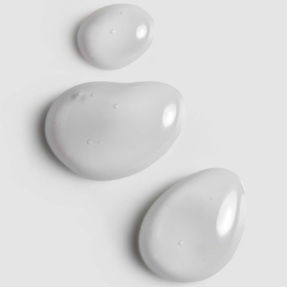 Three gray ceramic stones on a light gray background