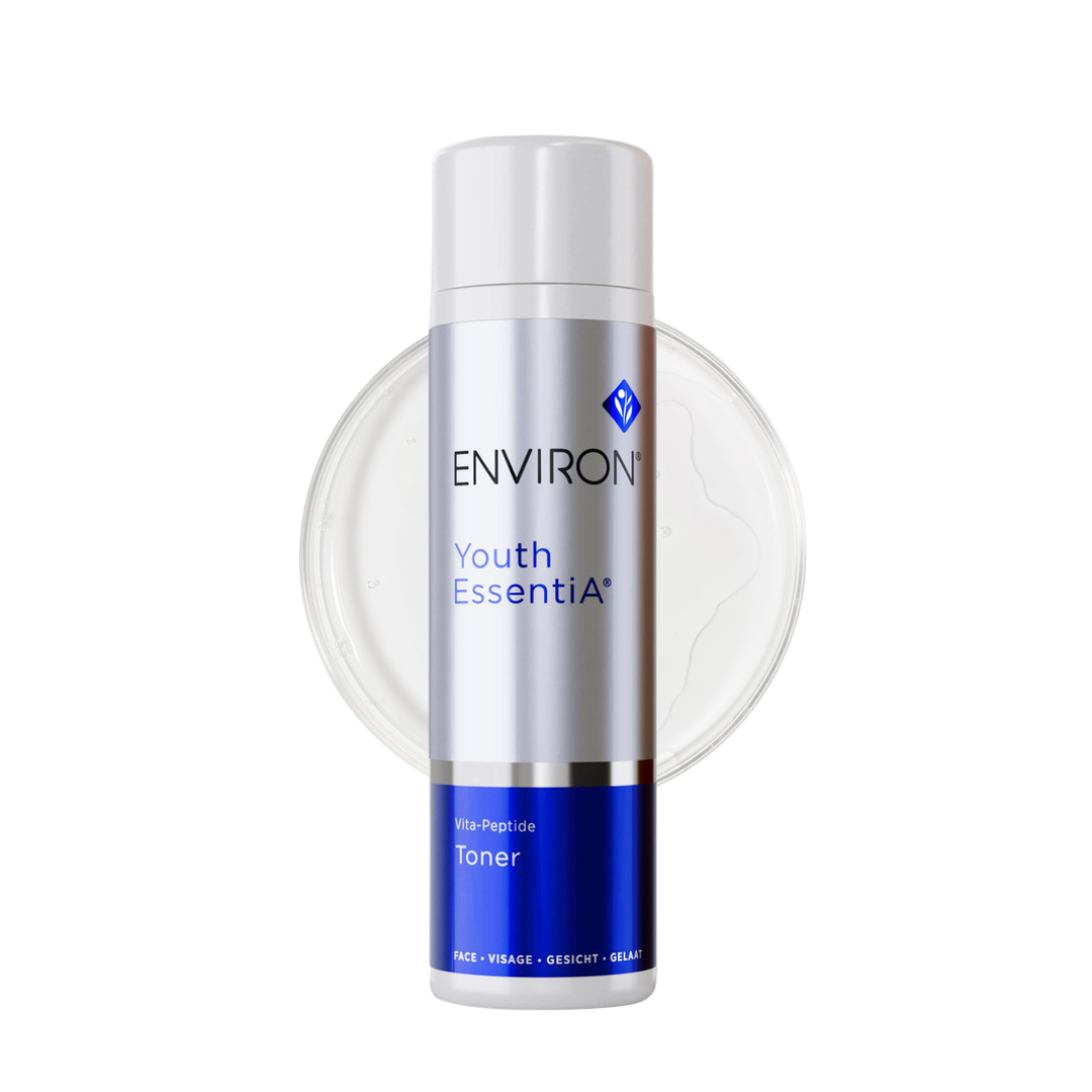 Environ Youth EssentiA Vita-Peptide Toner in a sleek blue and white 200ml bottle. The packaging features the Environ logo and product name prominently. This toner is formulated with peptides to enhance skin elasticity, smooth wrinkles, and promote a youthful radiance. Suitable for all skin types, especially mature and photo-damaged skin, it helps increase hydration, promote cell renewal, and boost collagen production.