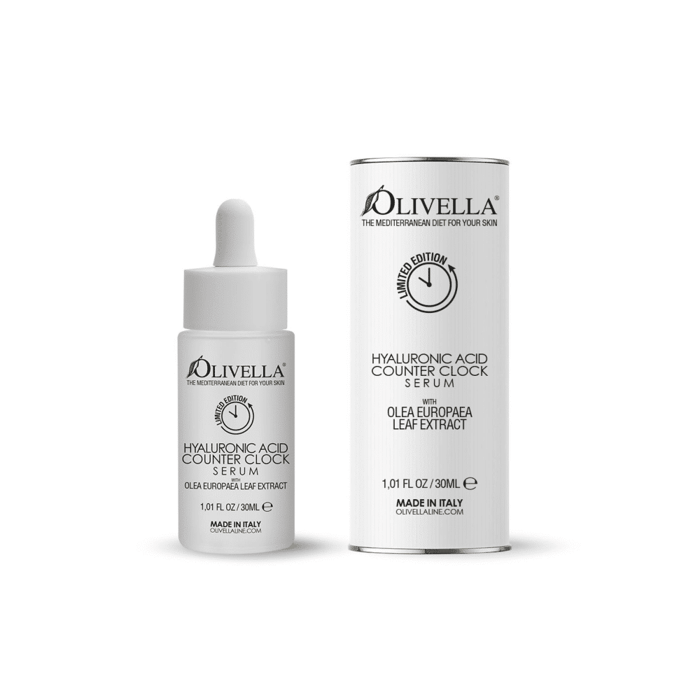 Olivella Counter Clock Hyaluronic Acid Face Serum packaging and bottle. The packaging is white with product information, and the bottle is clear with a dropper.